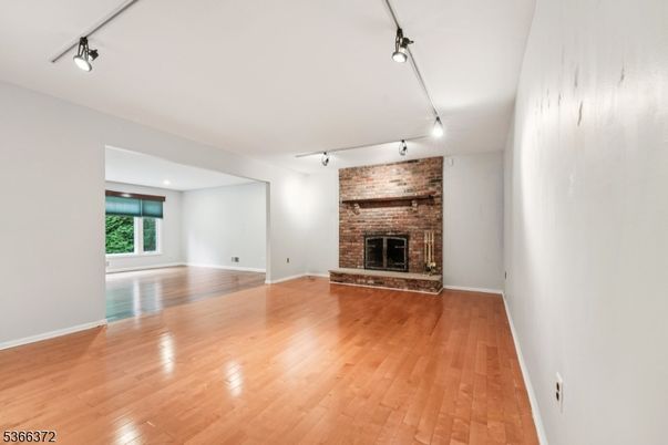 Empty room, Fireplace, Interior, Stone Walls, Wood Texture Flooring