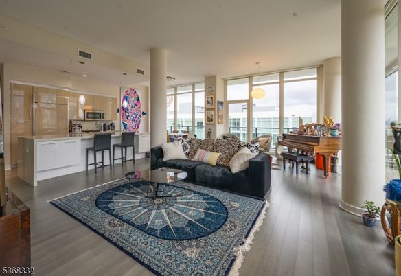 Dining room, Interior, Kitchen, Living room, Pendant Lights, Piano, Recessed Lighting, Water, Wood Texture Flooring