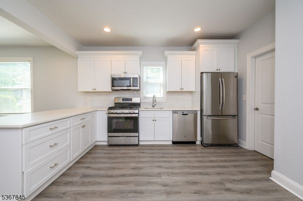 Interior, Kitchen, Recessed Lighting, Stainless Steel Appliances, Wood Texture Flooring