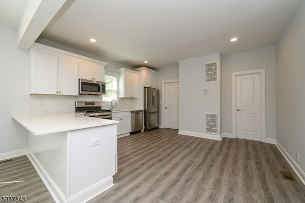 Interior, Kitchen, Recessed Lighting, Stainless Steel Appliances, Wood Texture Flooring