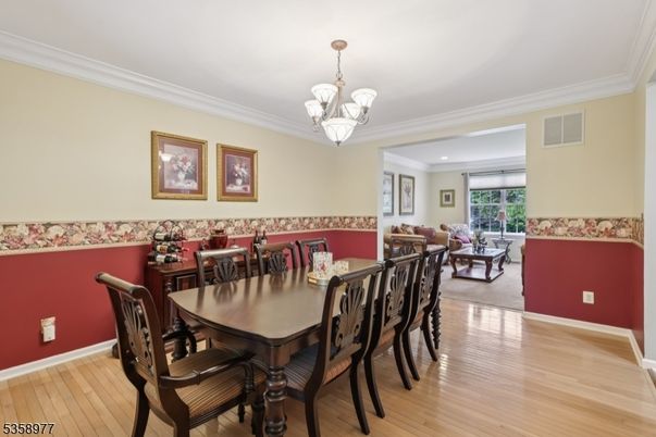 Chandelier, Dining room, Interior, Living room, Recessed Lighting, Wood Texture Flooring
