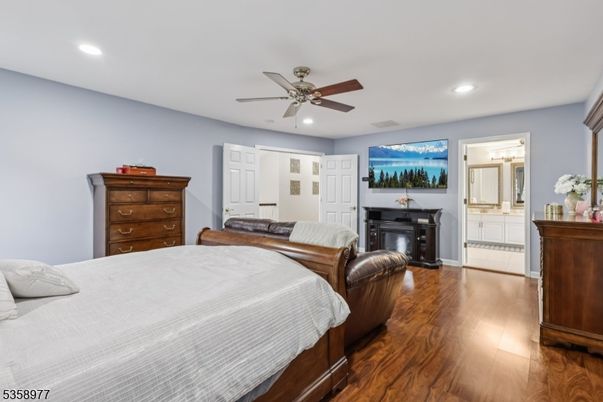 Bedroom, Fireplace, Interior, Recessed Lighting, Wood Texture Flooring