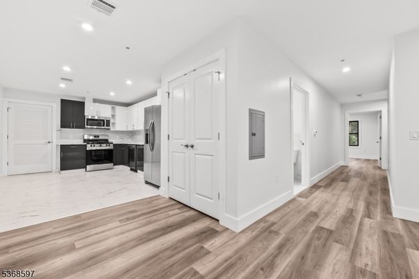 Interior, Kitchen, Marble, Recessed Lighting, Stainless Steel Appliances, Wood Texture Flooring