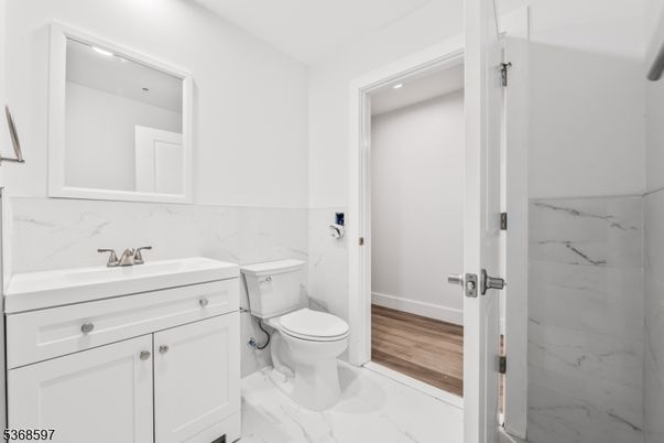 Bathroom, Interior, Marble, Marble Walls, Recessed Lighting, Wood Texture Flooring