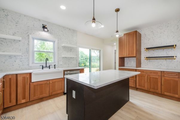 Interior, Kitchen, Marble Walls, Pendant Lights, Recessed Lighting, Wood Texture Flooring