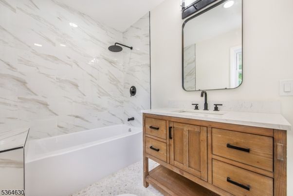 Bathroom, Dual Sink Vanities, Interior, Marble Walls, Recessed Lighting