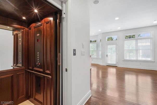 Elevator, Interior, Recessed Lighting, Wood Texture Flooring