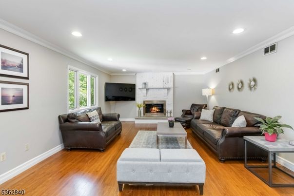 Fireplace, Interior, Living room, Recessed Lighting, Wood Texture Flooring