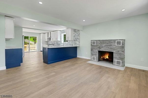 Fireplace, Interior, Kitchen, Recessed Lighting, Wood Texture Flooring