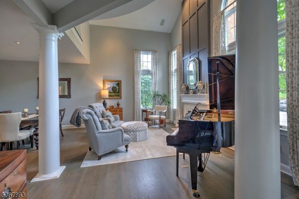 Dining room, Fireplace, Interior, Living room, Piano, Recessed Lighting, Wood Texture Flooring