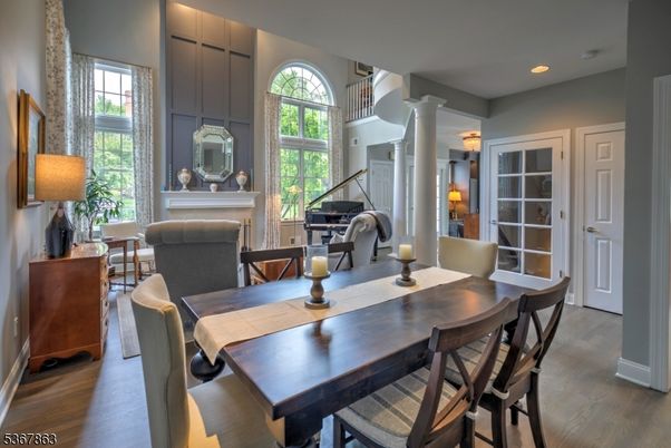 Dining room, Fireplace, Interior, Piano, Recessed Lighting, Wood Texture Flooring
