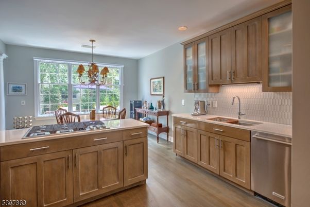 Chandelier, Dining room, Interior, Kitchen, Recessed Lighting, Stainless Steel Appliances, Wood Texture Flooring