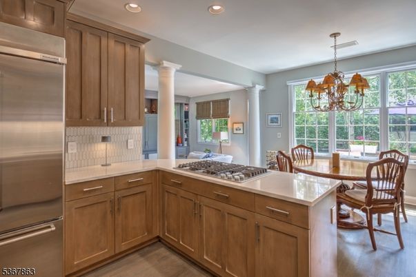 Chandelier, Dining room, Interior, Kitchen, Recessed Lighting, Stainless Steel Appliances, Wood Texture Flooring