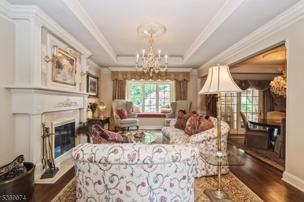 Chandelier, Dining room, Fireplace, Interior, Living room, Wood Texture Flooring