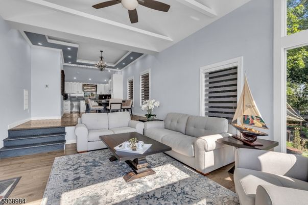Chandelier, Dining room, Interior, Kitchen, Living room, Recessed Lighting, Stainless Steel Appliances, Wood Texture Flooring