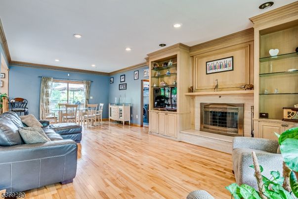 Dining room, Fireplace, Interior, Living room, Recessed Lighting, Wood Texture Flooring