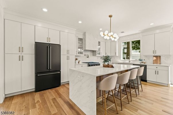 Interior, Kitchen, Marble Walls, Pendant Lights, Recessed Lighting, Wood Texture Flooring
