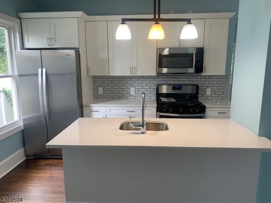 Interior, Kitchen, Pendant Lights, Stainless Steel Appliances, Wood Texture Flooring