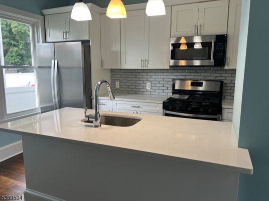 Interior, Kitchen, Pendant Lights, Stainless Steel Appliances, Wood Texture Flooring