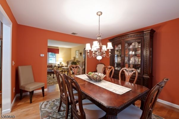 Chandelier, Dining room, Interior, Wood Texture Flooring
