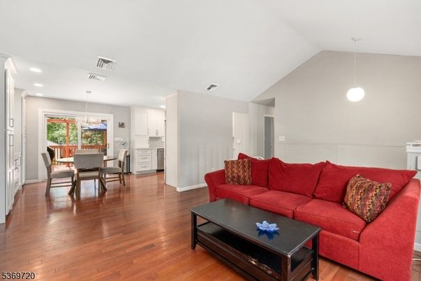 Chandelier, Dining room, Interior, Kitchen, Living room, Pendant Lights, Recessed Lighting, Wood Texture Flooring