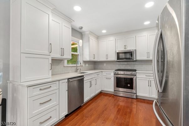 Interior, Kitchen, Recessed Lighting, Stainless Steel Appliances, Wood Texture Flooring