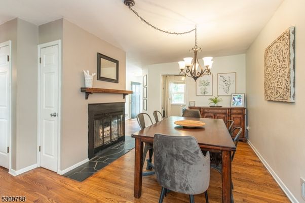 Chandelier, Dining room, Fireplace, Interior, Wood Texture Flooring