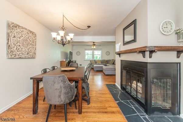 Chandelier, Dining room, Fireplace, Interior, Wood Texture Flooring