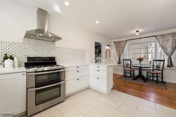 Dining room, Interior, Kitchen, Recessed Lighting, Stainless Steel Appliances, Wood Texture Flooring