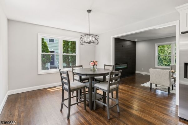 Dining room, Fireplace, Interior, Pendant Lights, Recessed Lighting, Wood Texture Flooring