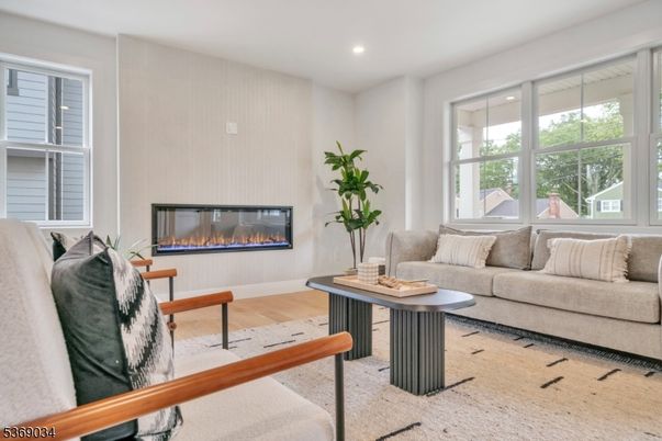 Fireplace, Interior, Living room, Recessed Lighting, Wood Texture Flooring