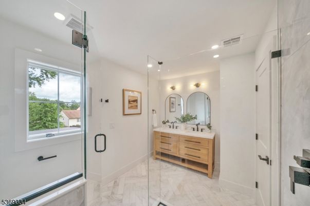 Bathroom, Dual Sink Vanities, Glass Shower, Interior, Marble, Recessed Lighting