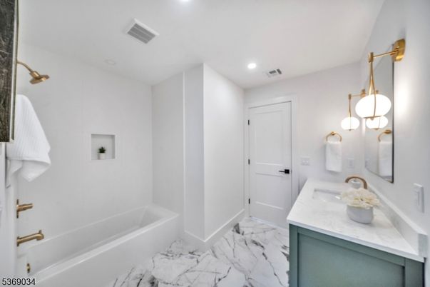 Bathroom, Dual Sink Vanities, Interior, Marble, Recessed Lighting