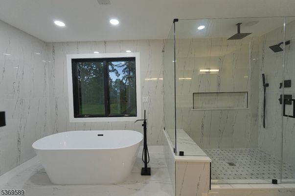 Bathroom, Free Standing Baths, Glass Shower, Interior, Marble, Marble Walls, Recessed Lighting