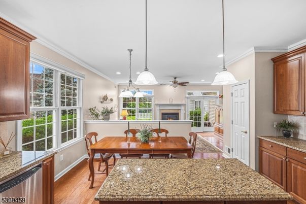 Dining room, Fireplace, Interior, Kitchen, Pendant Lights, Recessed Lighting, Wood Texture Flooring