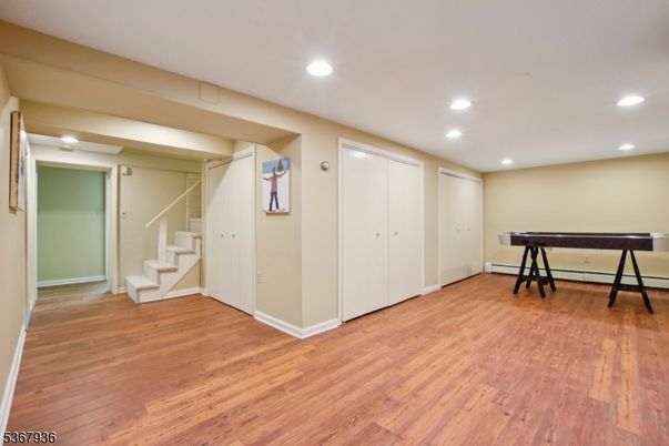 Empty room, Game Room, Interior, Recessed Lighting, Wood Texture Flooring