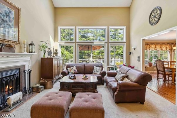 Dining room, Fireplace, Interior, Living room, Recessed Lighting, Wood Texture Flooring