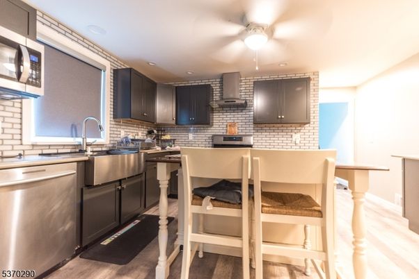 Interior, Kitchen, Recessed Lighting, Stone Walls, Wood Texture Flooring