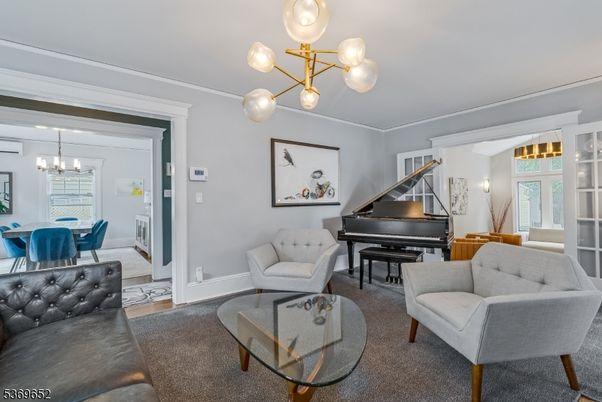 Dining room, Interior, Living room, Pendant Lights, Piano, Wood Texture Flooring
