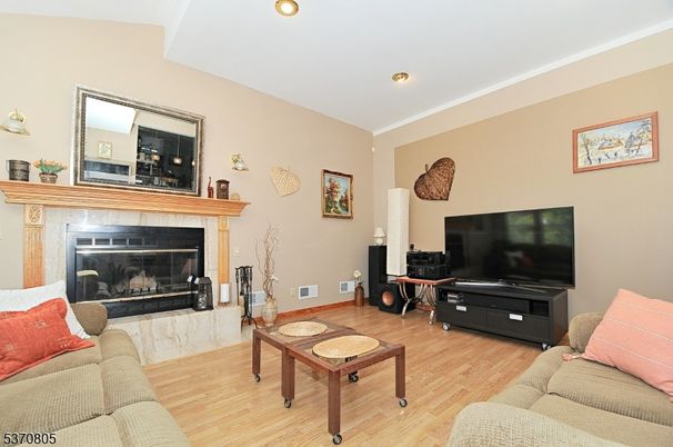 Fireplace, Interior, Living room, Recessed Lighting, Wood Texture Flooring