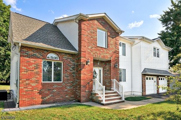 Attached, Exterior, Facade, Brick Facade, Brick Traditional