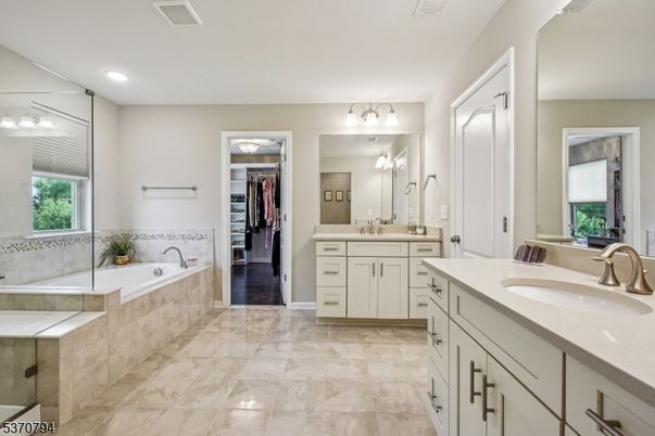 Bathroom, Dual Sink Vanities, Glass Shower, Interior, Recessed Lighting, Walk-in Closets