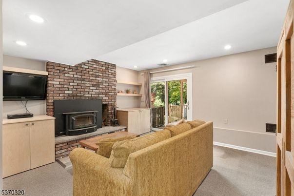 Fireplace, Interior, Living room, Recessed Lighting, Stone Walls