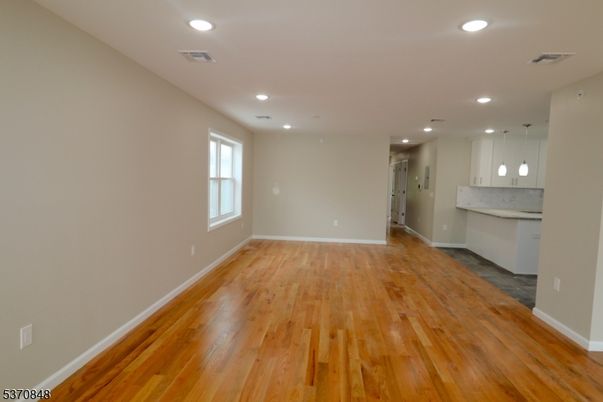 Empty room, Interior, Kitchen, Pendant Lights, Recessed Lighting, Wood Texture Flooring