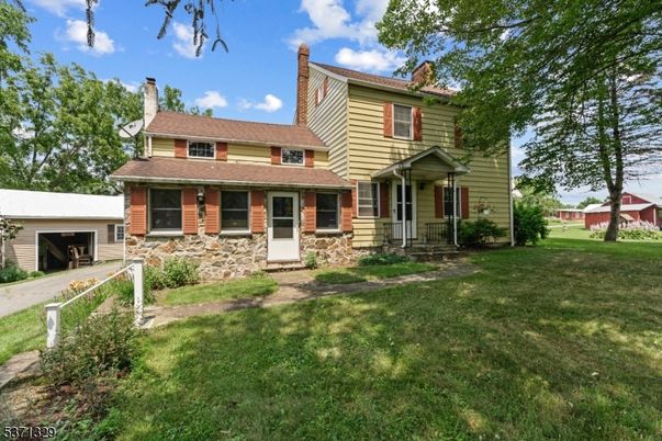 Backyard, Exterior, Facade, Brick Facade, American Foursquare