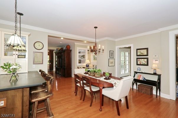 Chandelier, Dining room, Interior, Pendant Lights, Recessed Lighting, Wood Texture Flooring