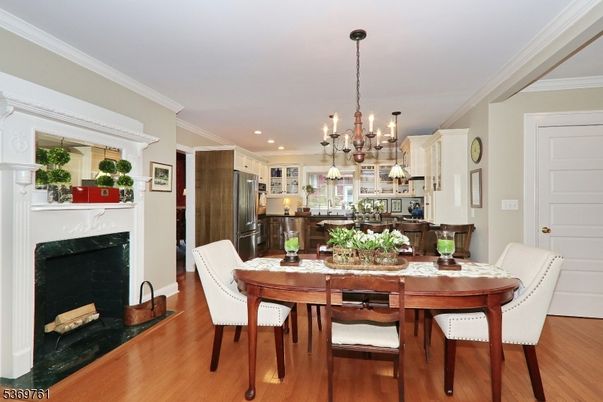 Chandelier, Dining room, Fireplace, Interior, Kitchen, Pendant Lights, Recessed Lighting, Wood Texture Flooring