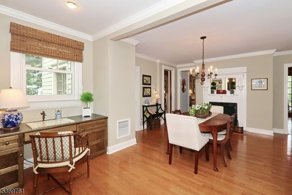 Chandelier, Dining room, Fireplace, Interior, Recessed Lighting, Wood Texture Flooring
