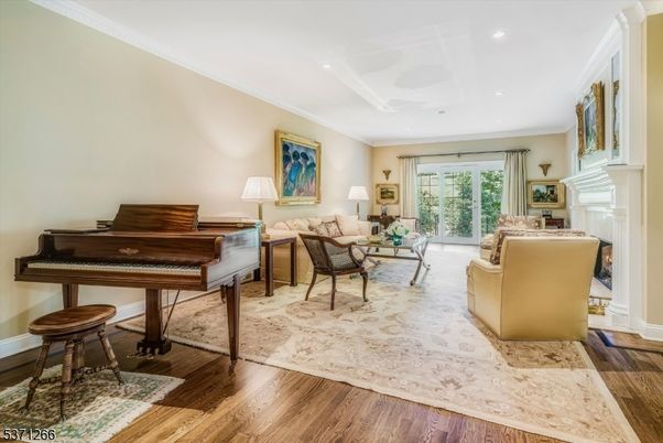 Fireplace, Interior, Living room, Piano, Recessed Lighting, Wood Texture Flooring