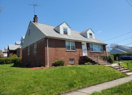 Exterior, Facade, Brick Facade, Cape Cod